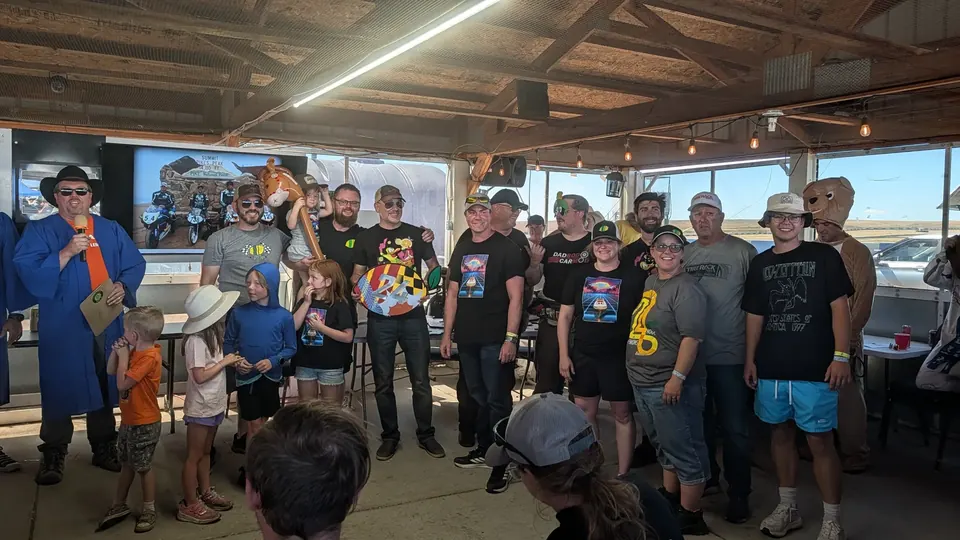 Dadbod Carmod team members with their trophy after the C Class win at High Plains Raceway.